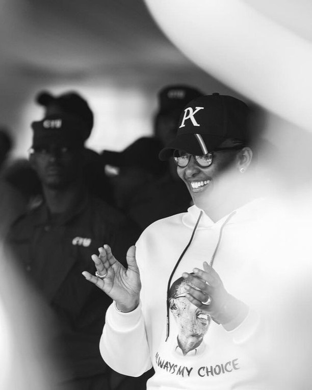 Guest in a custom printed hoodie and cap