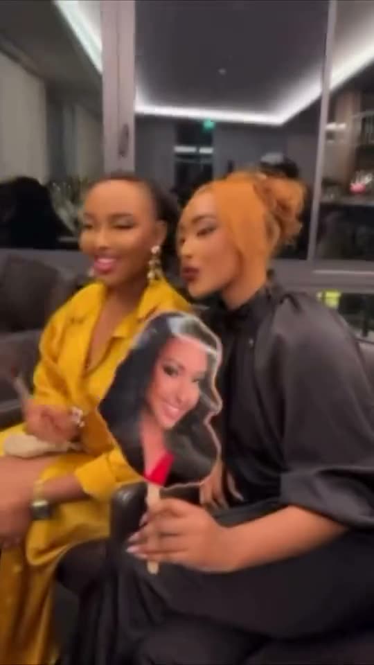 Custom face cut-out held up at an event